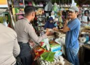 Polisi Hadir di Pasar Baru Way Kandis, Pastikan Keamanan Natal dan Tahun Baru